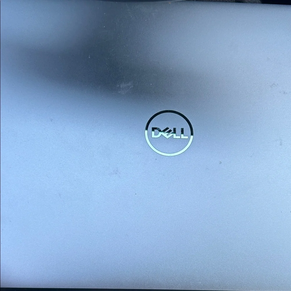 Dell Metallic Blue Laptop with Logo Accent
